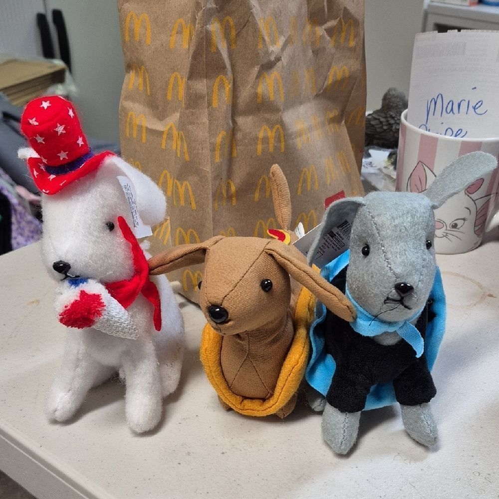 Set of Three Plush Dogs with Accessories